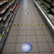 Floor stickers at a Tesco in London.